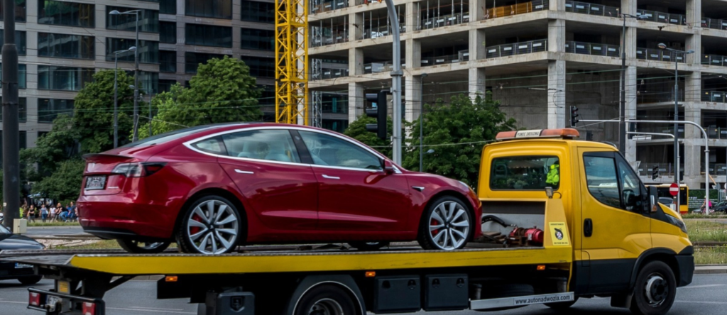 Tesla towing and roadside assistance Gandhinagar 